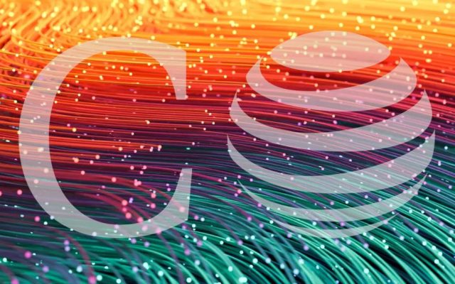Graphic of glowing wave-like fiber strands in gold, red, purple, teal and blue overlaid with a large translucent letter C