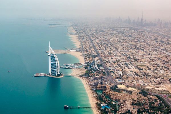 The coast and skyline of Dubai, UAE, across the water