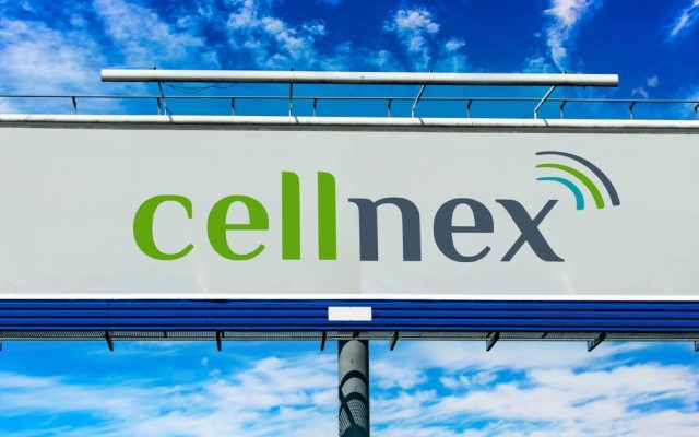Cellnex logo sign on a roadside billboard